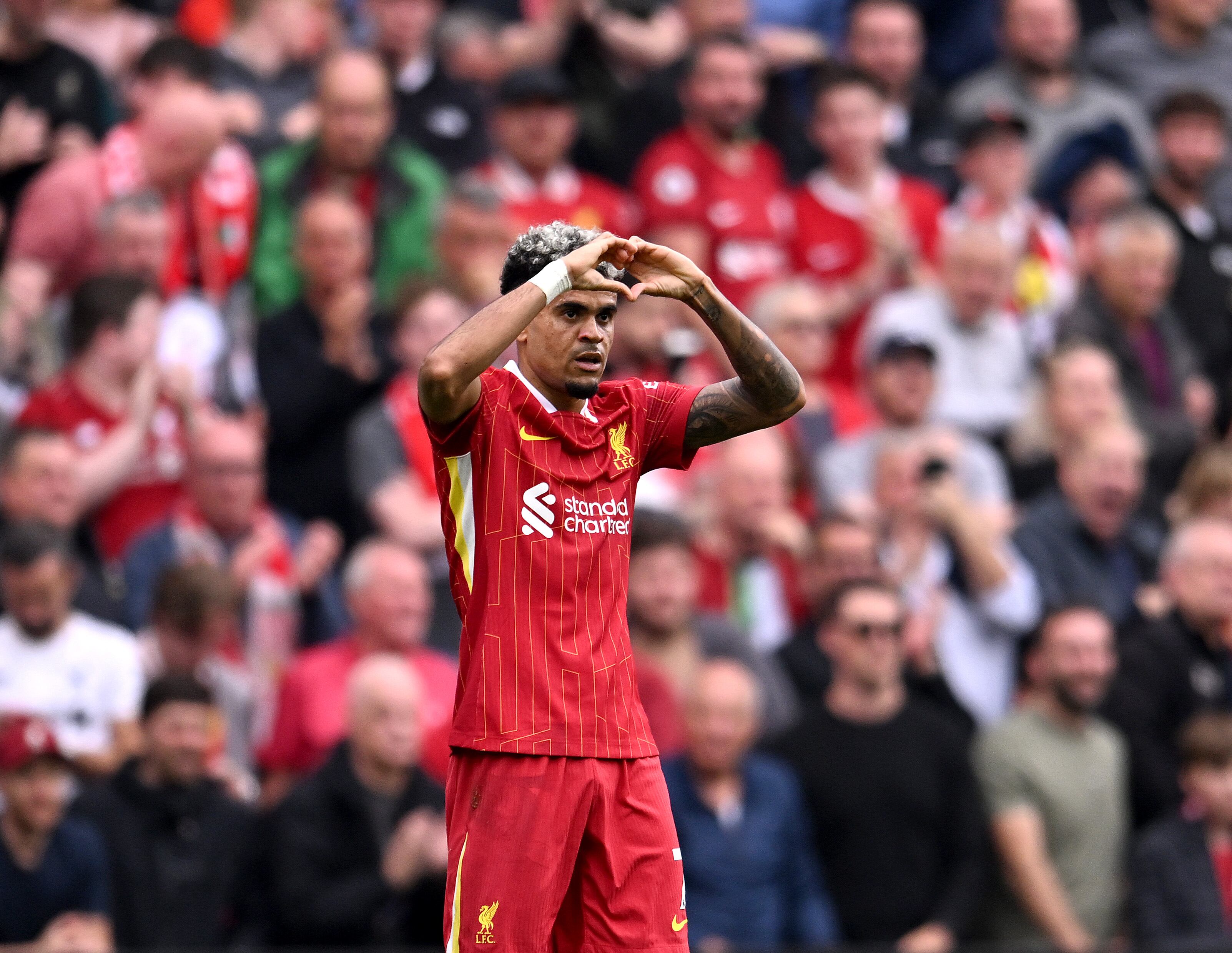 LIVERPOOL, ENGLAND - SEPTEMBER 21: (THE SUN OUT, THE SUN ON SUNDAY OUT) Luis Diaz of Liverpool celebrating after scoring the opening goal during the Premier League match between Liverpool FC and AFC Bournemouth at Anfield on September 21, 2024 in Liverpool, England. (Photo by Andrew Powell/Liverpool FC via Getty Images)