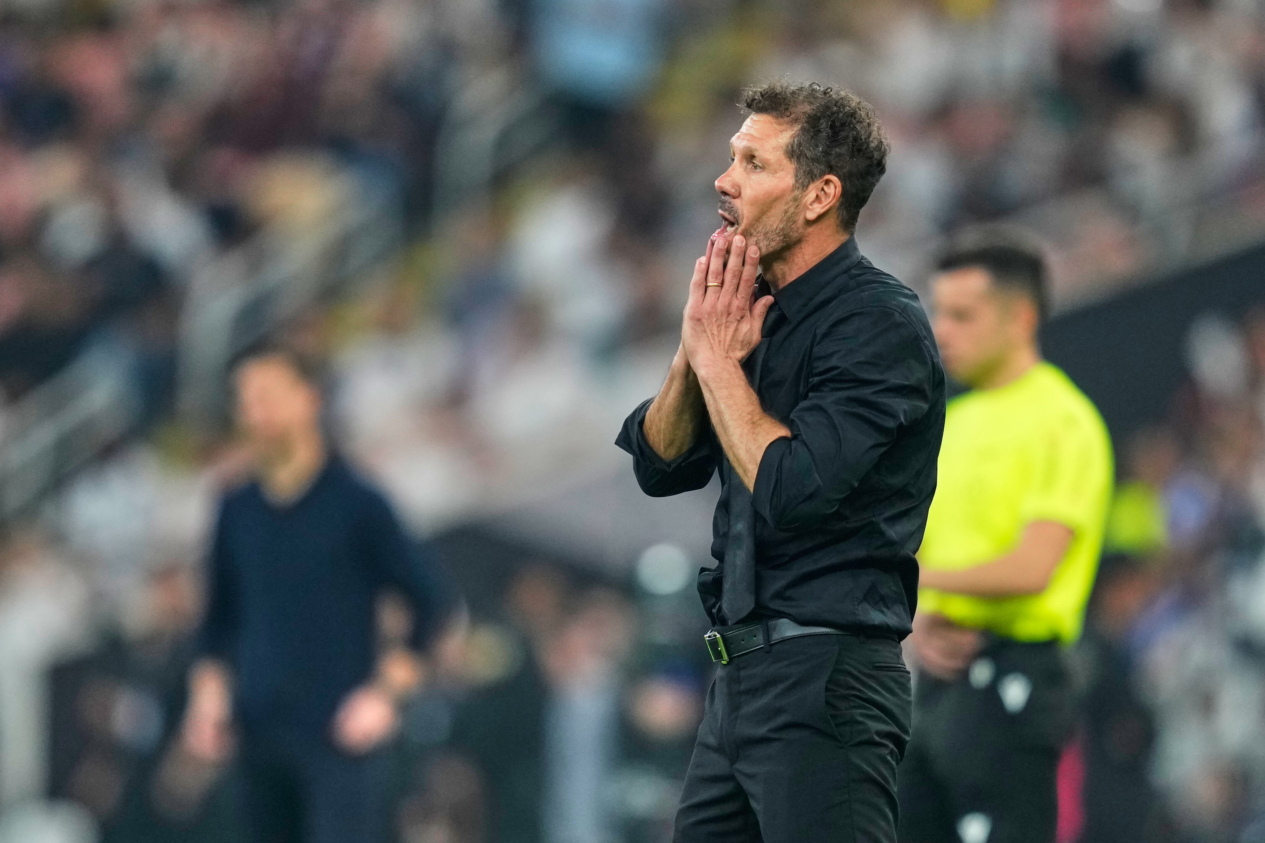 Atletico Madrid's head coach Diego Simeone gestures during the Spanish Super Cup semifinal soccer match against Real Madrid at King Abdullah Sports City Stadium in Jeddah, Saudi Arabia, Thursday, Jan. 8, 2026. (AP Photo/Altaf Qadri)