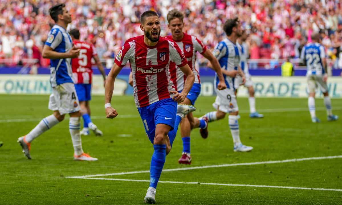 Atletico Madrid's Yannick Carrasco celebrates after scoring his side's second goal during a Spanish La Liga soccer match between Atletico Madrid and Espanyol at Wanda Metropolitano stadium in Madrid, Spain, Sunday, April 17, 2022. (AP/Manu Fernandez)