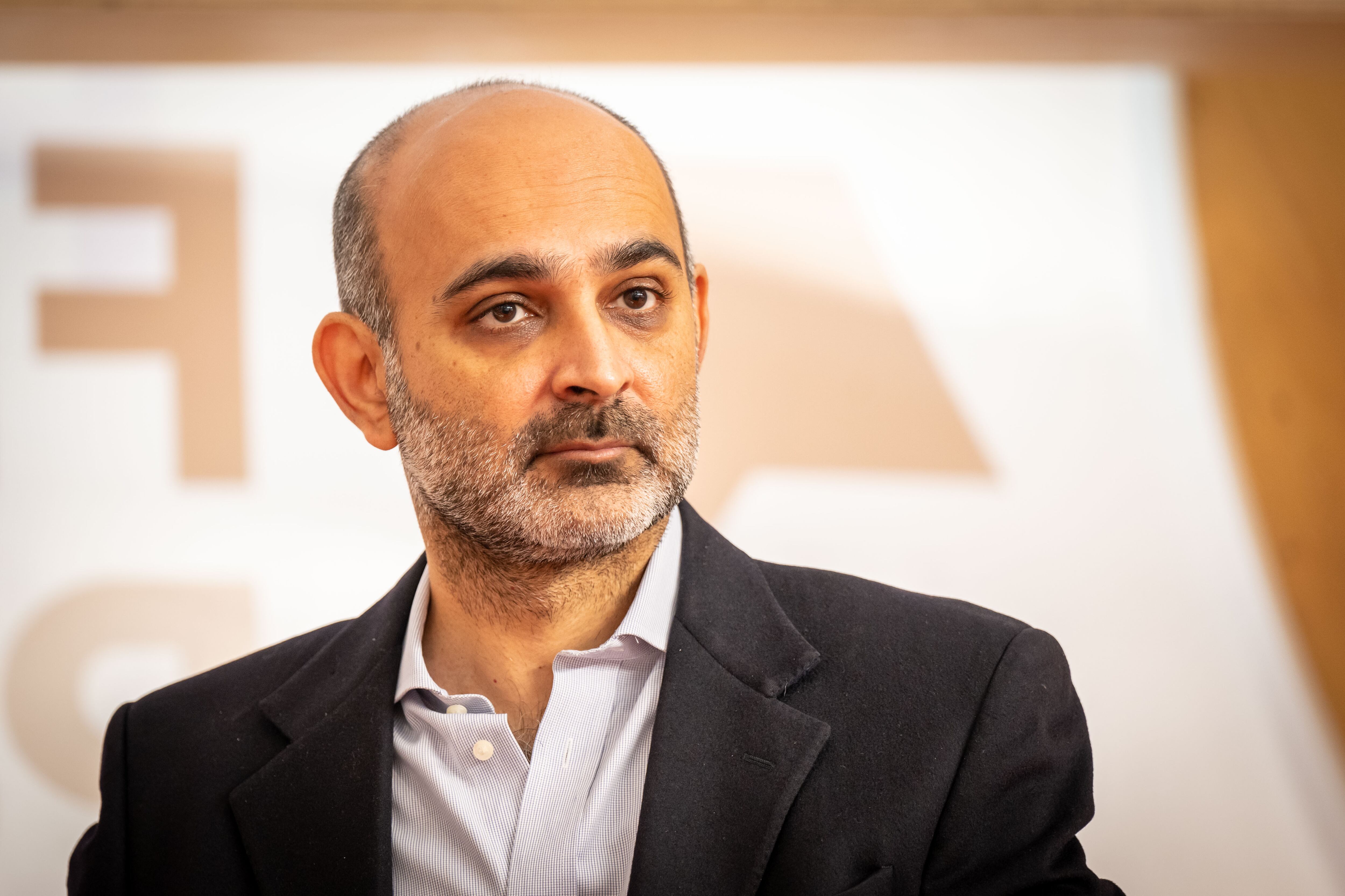 FRANKFURT AM MAIN, GERMANY - OCTOBER 18: Writer Mohsin Hamid attends the opening press conference of the 2022 Frankfurt Book Fair on October 18, 2022 in Frankfurt, Germany. This year's fair is the first to take place in its regular, full scope since the coronavirus pandemic. The official partner country this year is Spain. (Photo by Thomas Lohnes/Getty Images)