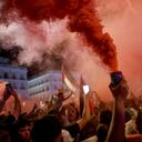 La gente protesta en medio del actual conflicto entre Israel y el grupo militante palestino Hamás, en Madrid.