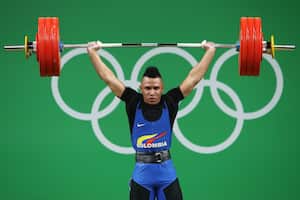 Luis Javier Mosquera | Levantamiento de pesas. Una vida de trabajo duro y sacrificios ha llevado al pesista vallecaucano a cosechar grandes triunfos desde muy joven. En 2014 ganó tres oros en el Campeonato Mundial Juvenil y otros tres en el Panamericano Juvenil. Tras una cirugía de hernia discal, Luis llegó a los Olímpicos de Río y obtuvo medalla de bronce. Foto: Julian Finney/Getty Images