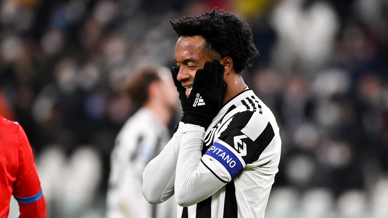 Juventus' Juan Cuadrado after missing an opportunity during the Italian Serie A soccer match between Juventus and Napoli at the Allianz stadium in Turin, Italy, Thursday, Jan. 6, 2022. (Marco Alpozzi/LaPresse via AP)