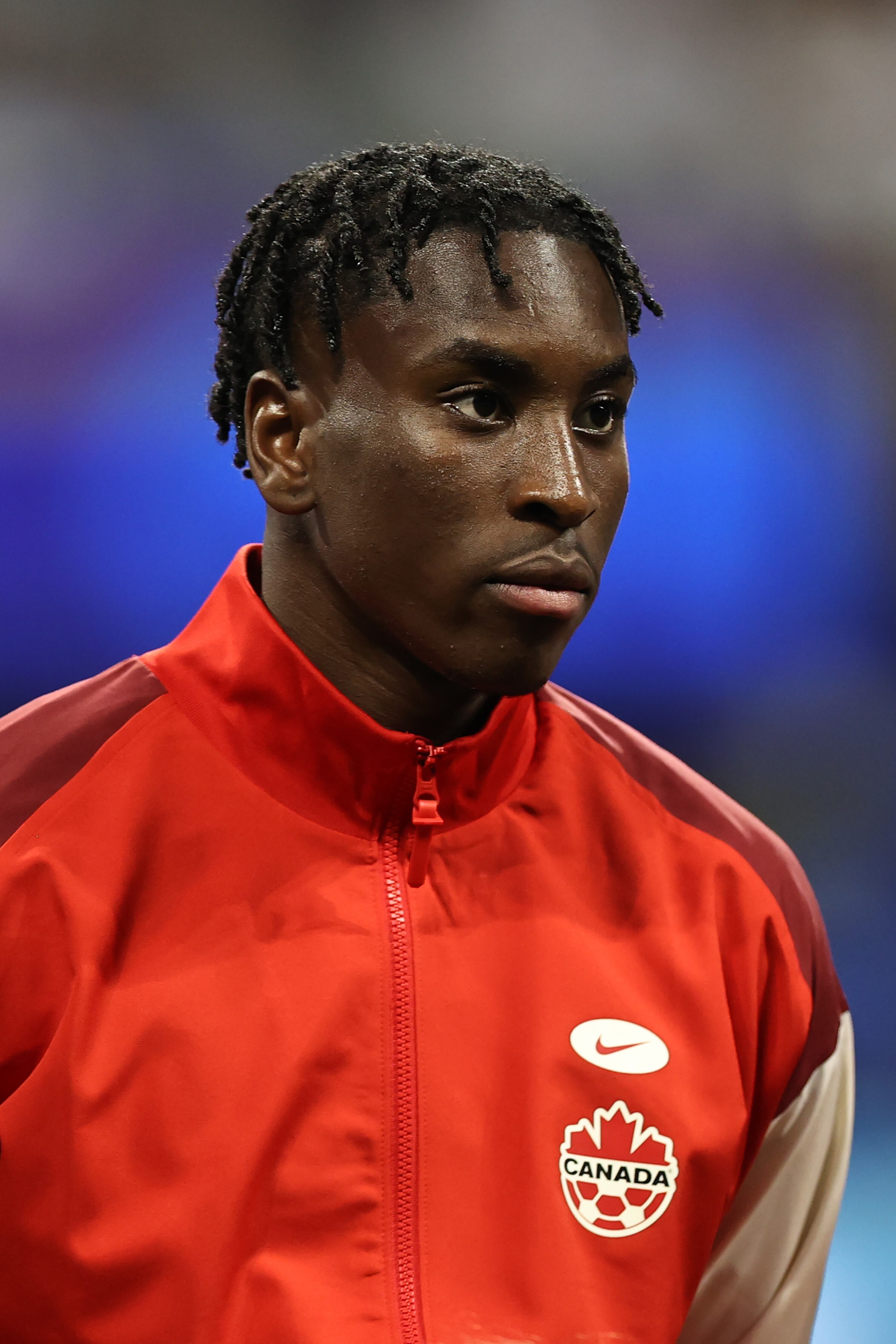 ATLANTA, GEORGIA - JUNE 20: Moïse Bombito of Canada lines up for the national anthem prior to the CONMEBOL Copa America group A match between Argentina and Canada at Mercedes-Benz Stadium on June 20, 2024 in Atlanta, Georgia. (Photo by Omar Vega/Getty Images)