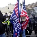 Trump supporters try to break through a police barrier, Wednesday, Jan. 6, 2021, at the Capitol in Washington. As Congress prepares to affirm President-elect Joe Biden's victory, thousands of people have gathered to show their support for President Donald Trump and his claims of election fraud. (AP Photo/Julio Cortez)