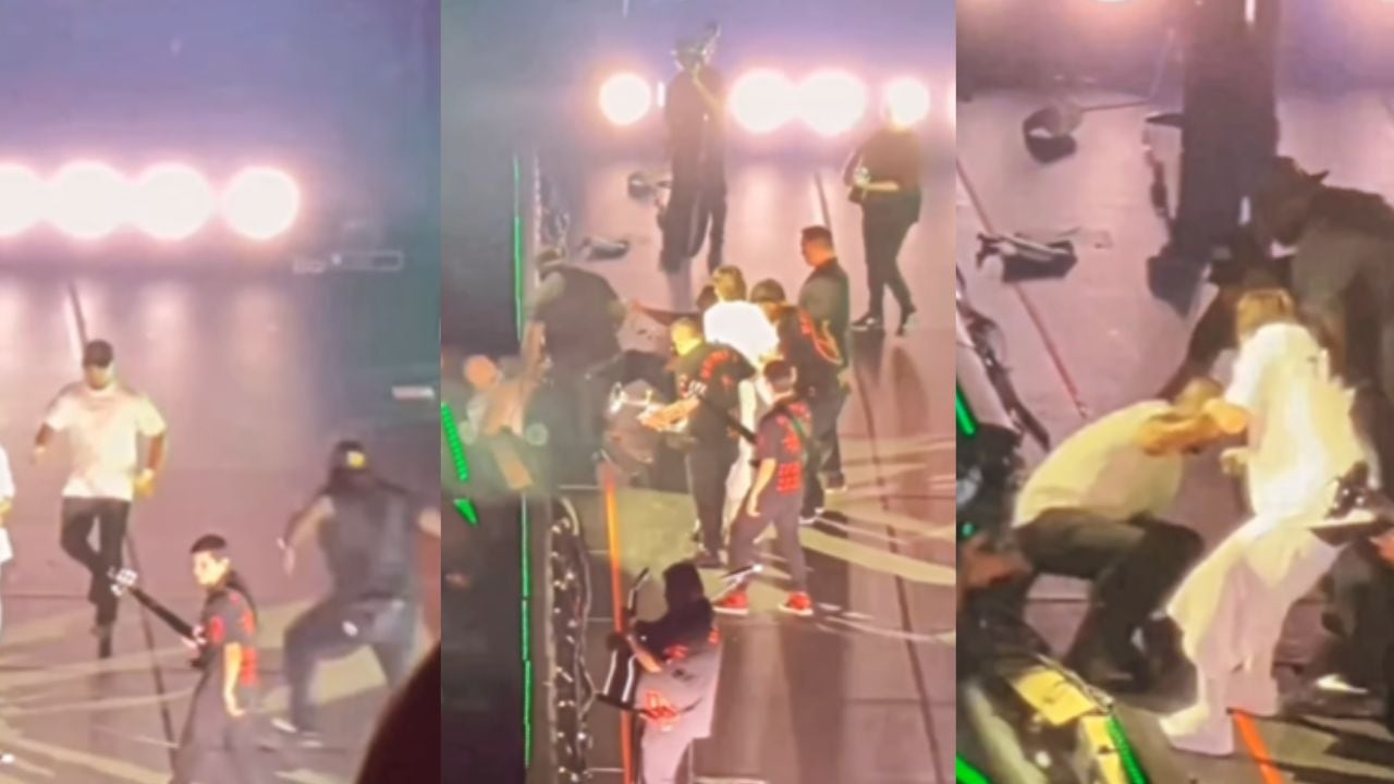 Momento en el que un seguidor es interceptado por la seguridad de Peso Pluma.