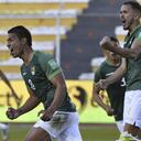 Bolivia's Diego Bejarano, center, celebrates after he scored his team's second goal against Venezuela during a World Cup qualifying soccer match in La Paz, Bolivia, Thursday, June 3, 2021. (Aizar Raldes/Pool via AP)