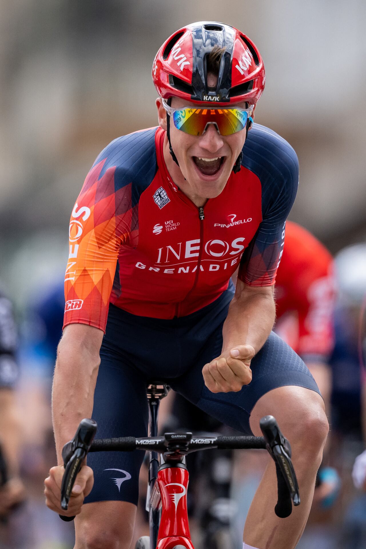 Britain's Ethan Hayter celebrates after winning the second stage of the Tour of Romandie UCI cycling World tour, 162.7 km from Morteau, France to La Chaux-de-Fonds, on April 27, 2023. (Photo by Fabrice COFFRINI / AFP)