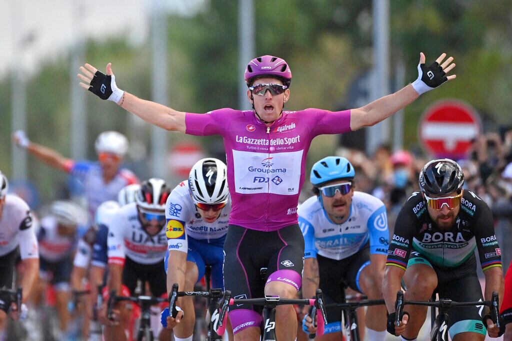France's Arnaud Démare celebrates as he crosses the finish line to win the 11th stage of the Giro d'Italia cycling race, from Porto Sant'Elpidio to Rimini, Italy, Wednesday, Oct. 14, 2020. (Massimo Paolone/LaPresse via AP)