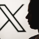 BRAZIL - 2023/07/24: In this photo illustration, a woman's silhouette holds a smartphone with the Twitter (X) new logo in the background. (Photo Illustration by Rafael Henrique/SOPA Images/LightRocket via Getty Images)