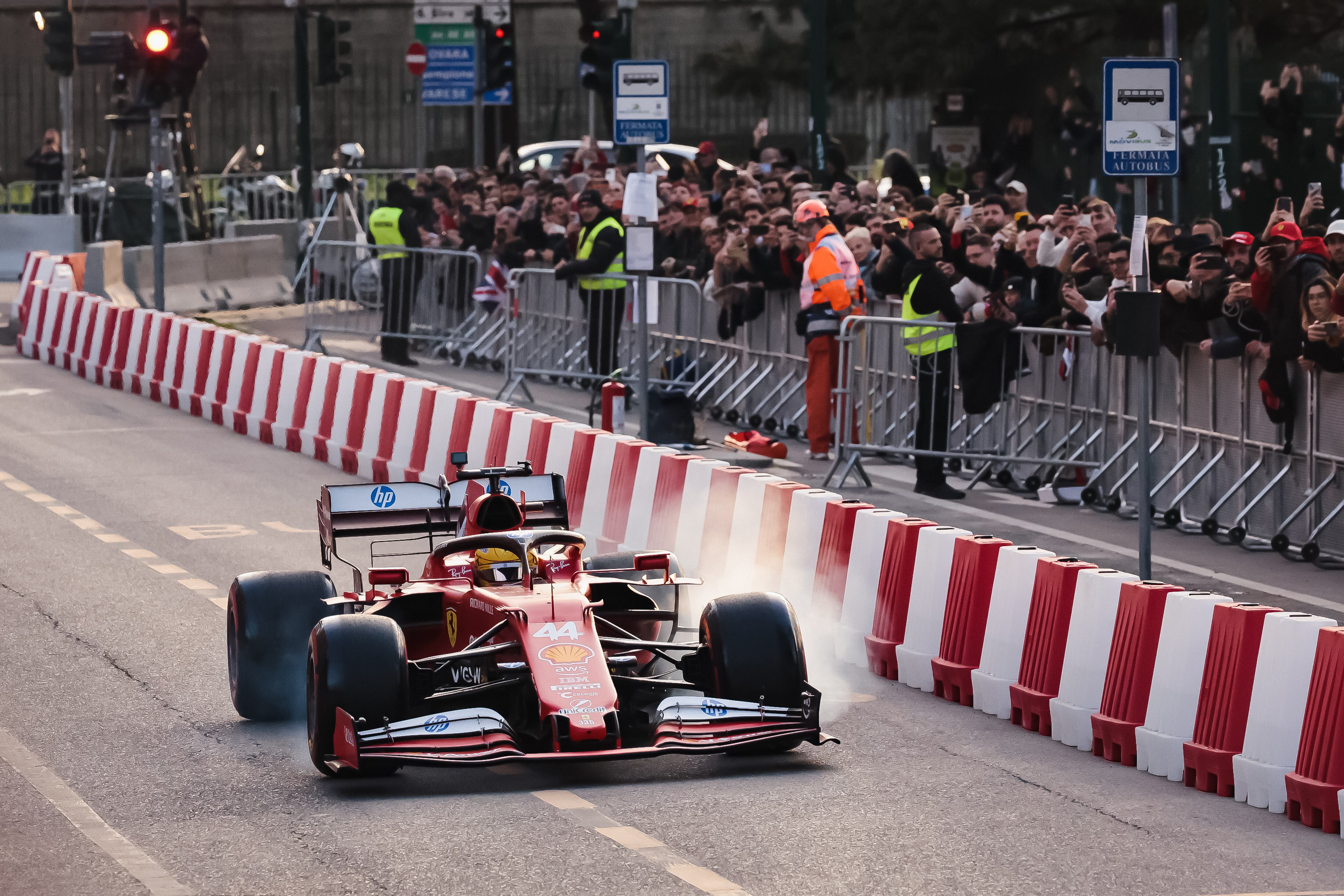 Lewis Hamilton drives a Ferrari single-seater F1 car during the Scuderia Ferrari HP Drivers' Presentation by UniCredit event with a street demo on the city circuit through the streets of the city center in Milan, Italy, on March 6, 2025 (Photo by Alessandro Bremec/NurPhoto via Getty Images).