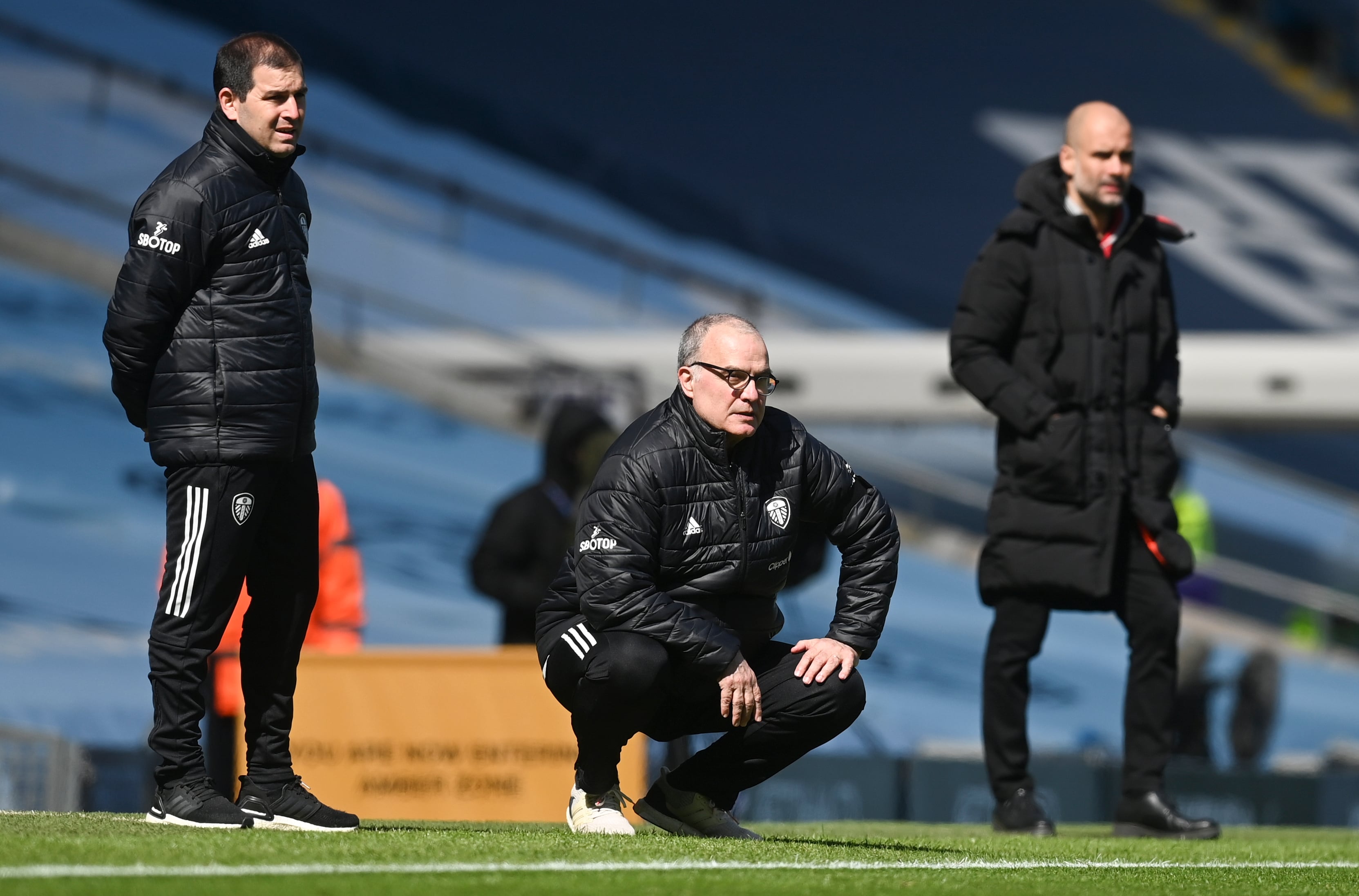 Marcelo Bielsa y, en el fondo, Guardiola.