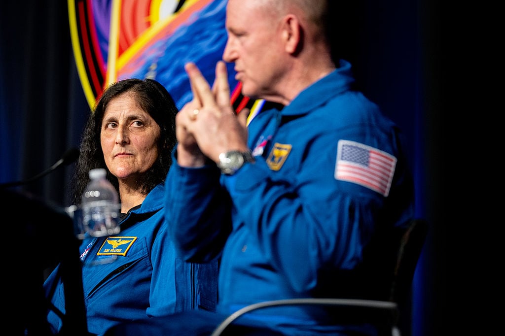 HOUSTON, TEXAS - MARCH 31: (L-R) Astronauts Sunita "Suni" Williams, and Barry "Butch" Wilmore speak during a news conference at the NASA Johnson Space Center on March 31, 2025 in Houston, Texas. Williams and Wilmore answered questions regarding their SpaceX Crew-9 mission and extended time on the International Space Station. The two astronauts were launched to the ISS aboard a Boeing Starliner spacecraft for a scheduled eight-day mission in June 2024. After spacecraft malfunctions the pair were directed to stay, prolonging the mission nine months. They returned to Earth on March 18 aboard a SpaceX Dragon spacecraft. (Photo by Brandon Bell/Getty Images)