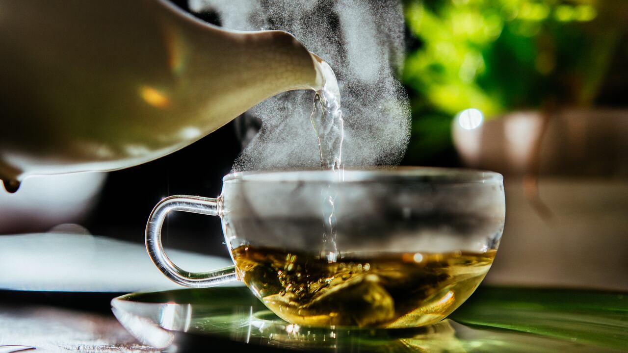 Fresh hot water for organic sage herbal tea at teatime.