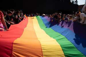 GDANSK, POLAND - 2023/05/27: Participants in the march unfurled the rainbow flag. The 8th Tri-City Equality March under the slogan "diversity is freedom" passed in Gdask. The march was opened by the mayor of the city, Aleksandra Dulkiewicz, accompanied by music, rainbow flags and interesting costumes of the participants. The parade showed that communities are diverse and every community is equally important. (Photo by Agnieszka Pazdykiewicz/SOPA Images/LightRocket via Getty Images)