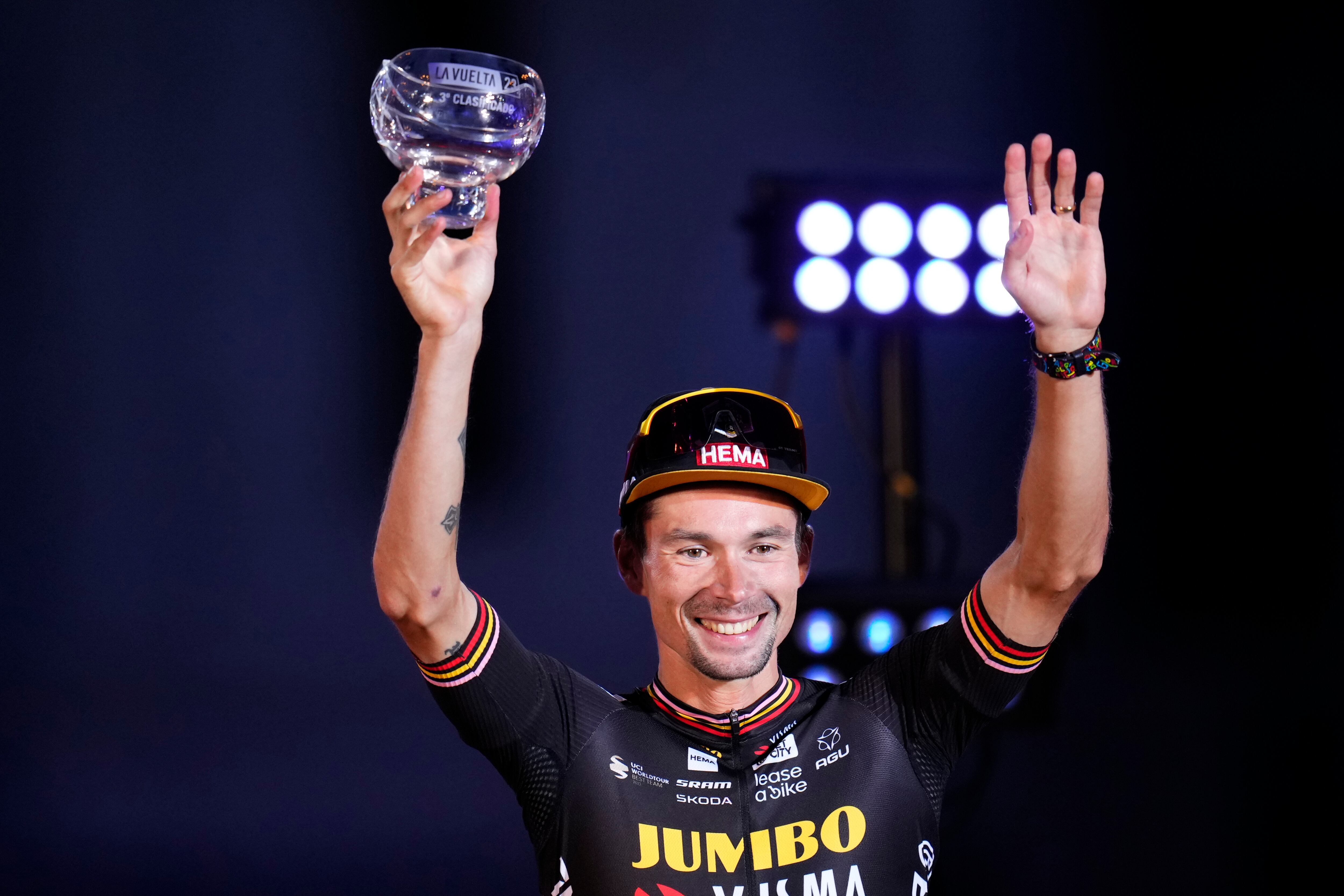 Primoz Roglic of Jumbo-Visma celebrates on the podium after winning the third place at the 21st stage of the Vuelta cycling race between Hipodromo de La Zarzuela and Madrid, Spain, Sunday, Sept. 17, 2023. (AP Photo/Manu Fernandez)