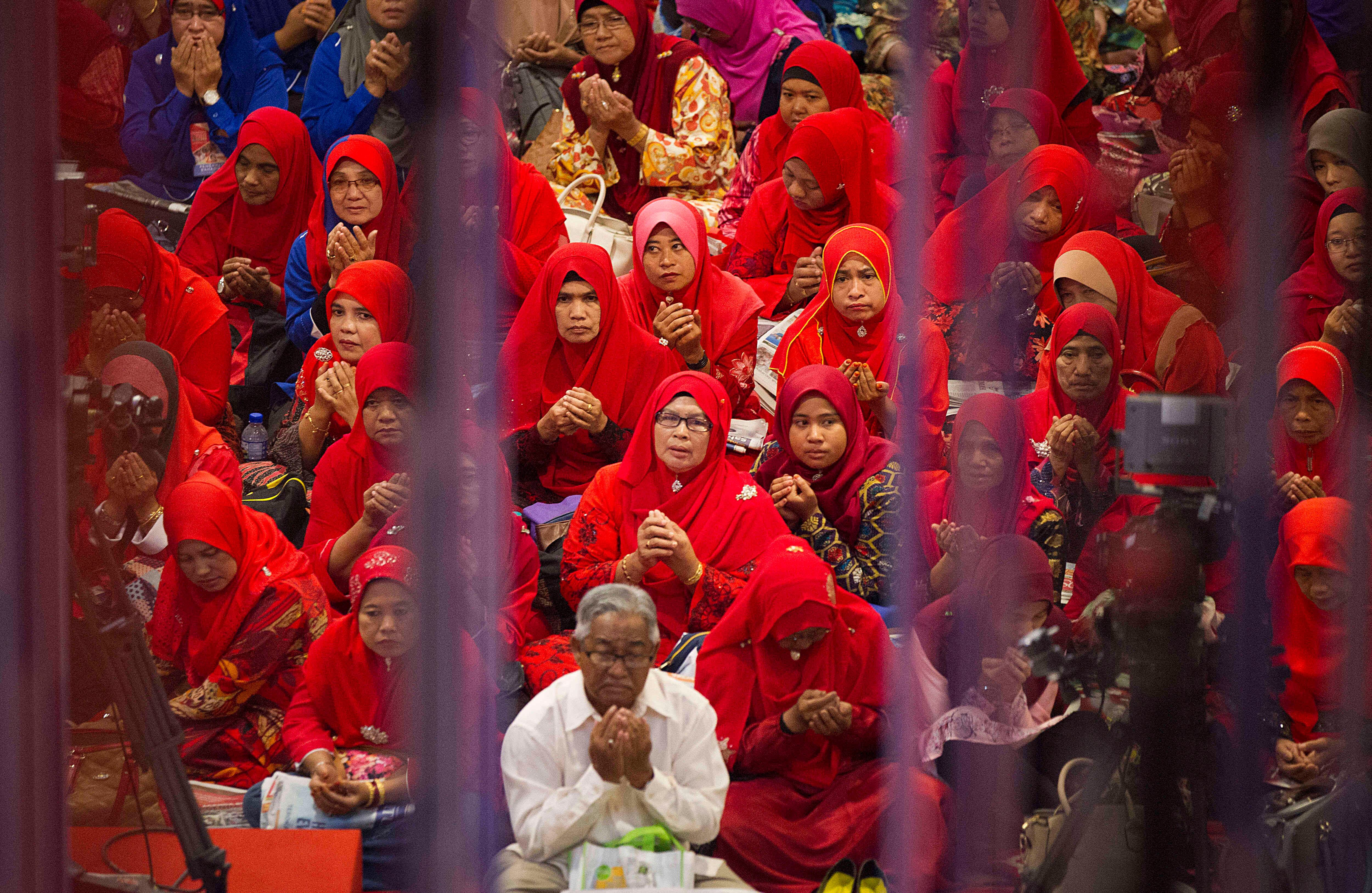 Organización Nacional de Malayos Unidos rezando en la Asamblea General durante el acto de apertura. Foto: AP.