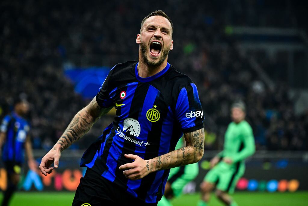 MILAN, ITALY - FEBRUARY 20: Marko Arnautovic of Inter Milan celebrates after scoring a goal during the UEFA Champions League round 16 match between Inter Milan and Atletico Madrid at San Siro Stadium in Milan, Italy on February 20, 2024. (Photo by Piero Cruciatti/Anadolu via Getty Images)