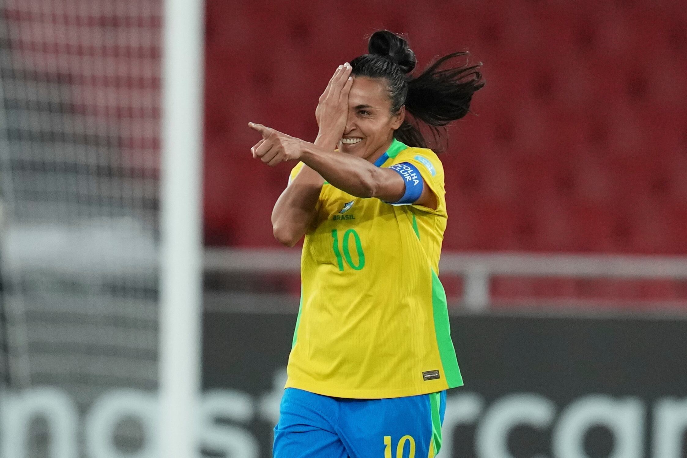 Brazil's Marta celebrates scoring her side's third goal, from the penalty spot, during a Women's Copa America soccer semifinal against Uruguay at Rodrigo Paz Delgado stadium in Quito, Ecuador, Tuesday, July 29, 2025. (AP Photo/Dolores Ochoa)