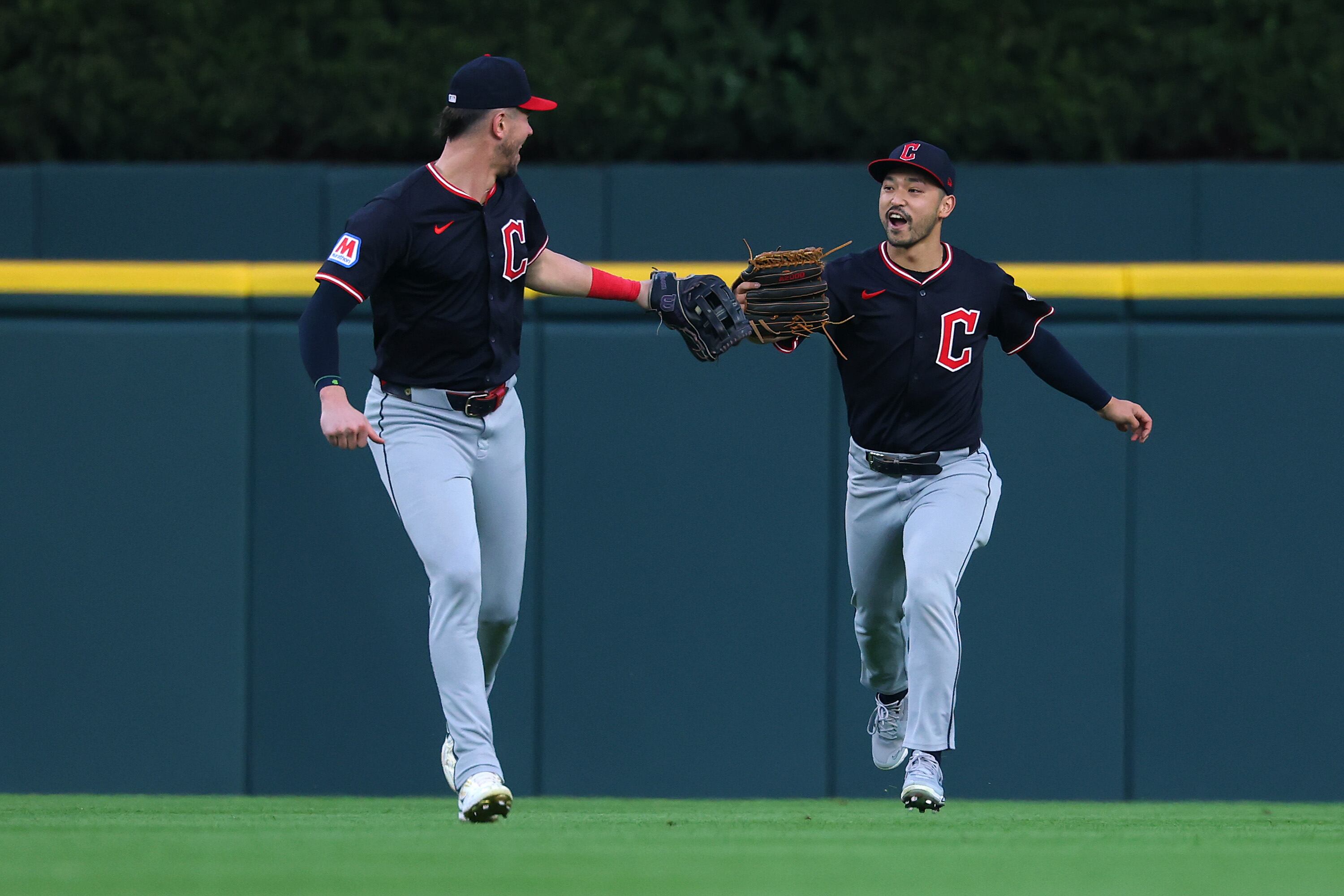 DETROIT, MICHIGAN - SEPTEMBER 17: Steven Kwan #38 of the Cleveland Guardians celebrates a catch in the second inning with Nolan Jones #22 while playing the Detroit Tigers at Comerica Park on September 17, 2025 in Detroit, Michigan. (Photo by Gregory Shamus/Getty Images)