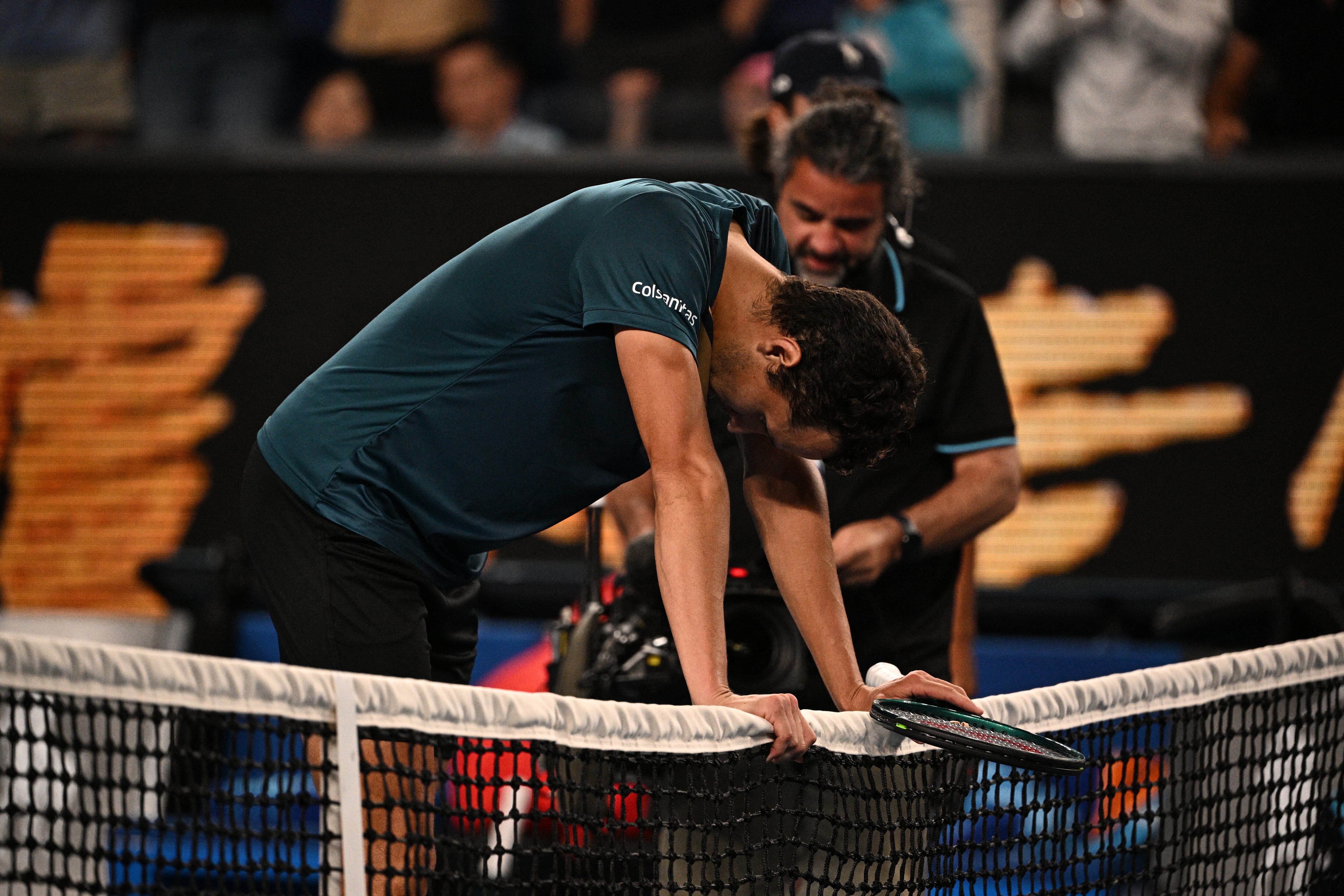Colombia's Daniel Galan celebrates victory over Australia's Jason Kubler in their men's singles match on day one of the Australian Open tennis tournament in Melbourne on January 14, 2024. (Photo by Anthony WALLACE / AFP) / -- IMAGE RESTRICTED TO EDITORIAL USE - STRICTLY NO COMMERCIAL USE --