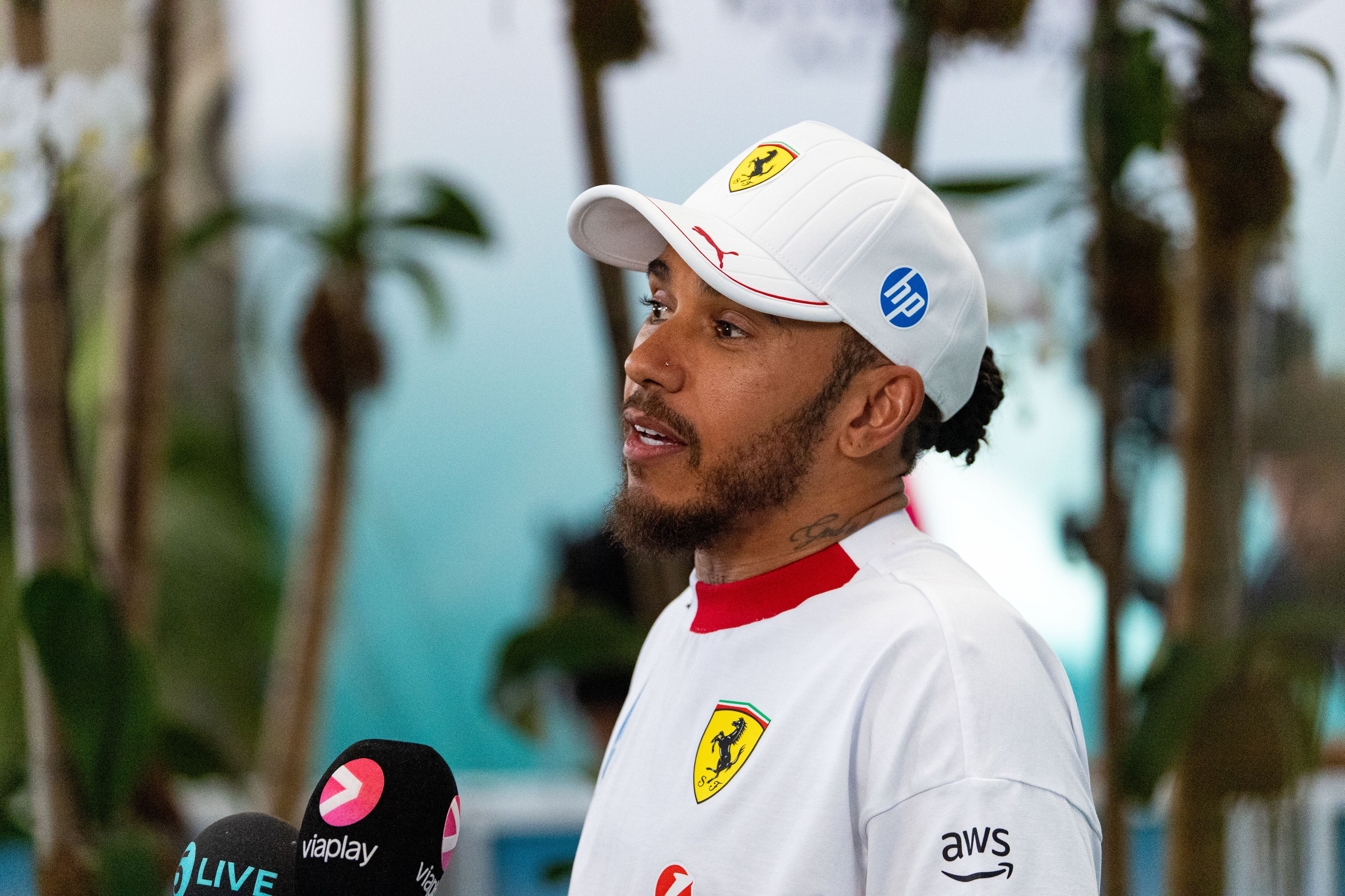 MIAMI, FLORIDA - MAY 4: Lewis Hamilton of Great Britain and Ferrari speaks in the media pen during the F1 Grand Prix of Miami at Miami International Autodrome on May 4, 2025 in Miami, United States. (Photo by Kym Illman/Getty Images)