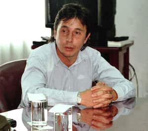 (FILE): This November 1999 file photo shows suspected Colombian drug lord Fabio Ochoa after being arrested in Bogota, Colombia. Ochoa, 43, a former lieutenant of the late kingpin Pablo Escobar, is suspected of involvement in shipping some 30 tonnes of cocaine a month -- with an estimated value of five billion UD -- to the United States, where he is expected to be extradited at any time. (FILM) AFP PHOTO/Javier Casella (Photo by JAVIER CASELLA / AFP)