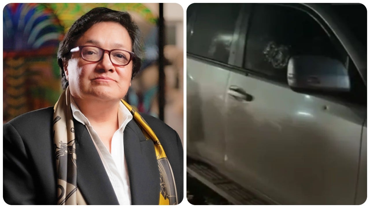 Amelia Pérez y el vehículo donde iba su funcionario de la SAE en Atlántico.