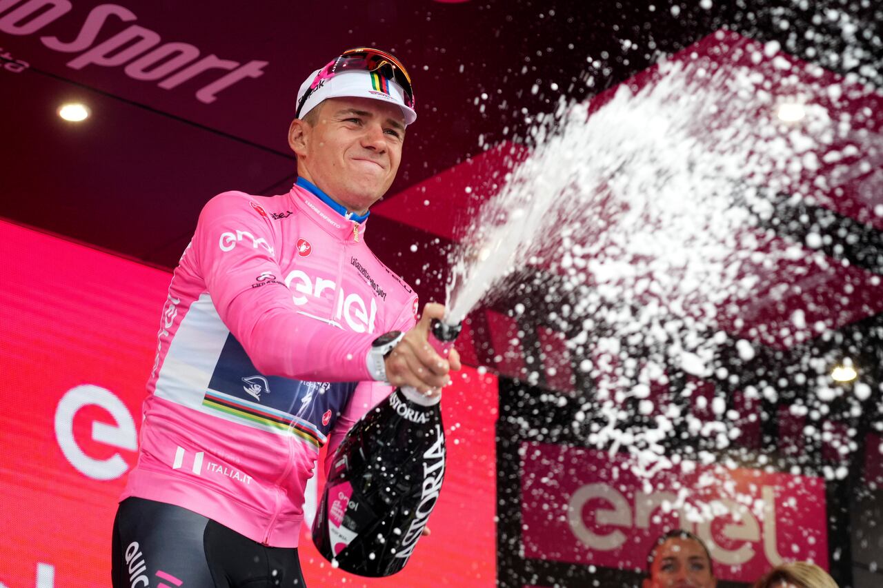 Belgium's Remco Evenepoel celebrates maintaining the pink jersey of the overall leader after the third stage of the Giro d'Italia cycling race from Vasto to Melfi, Italy, Monday, May 8, 2023. (Gian Mattia D'Alberto/LaPresse via AP)