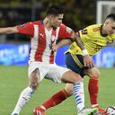 BARRANQUILLA, COLOMBIA - NOVEMBER 16: Rafael Santos Borre of Colombia and Luis Amarilla of Paraguay fight for the ball during a match between Colombia and Paraguay as part of FIFA World Cup Qatar 2022 Qualifiers at Estadio Metropolitano on November 16, 2021 in Barranquilla, Colombia. (Photo by Gabriel Aponte/Getty Images)