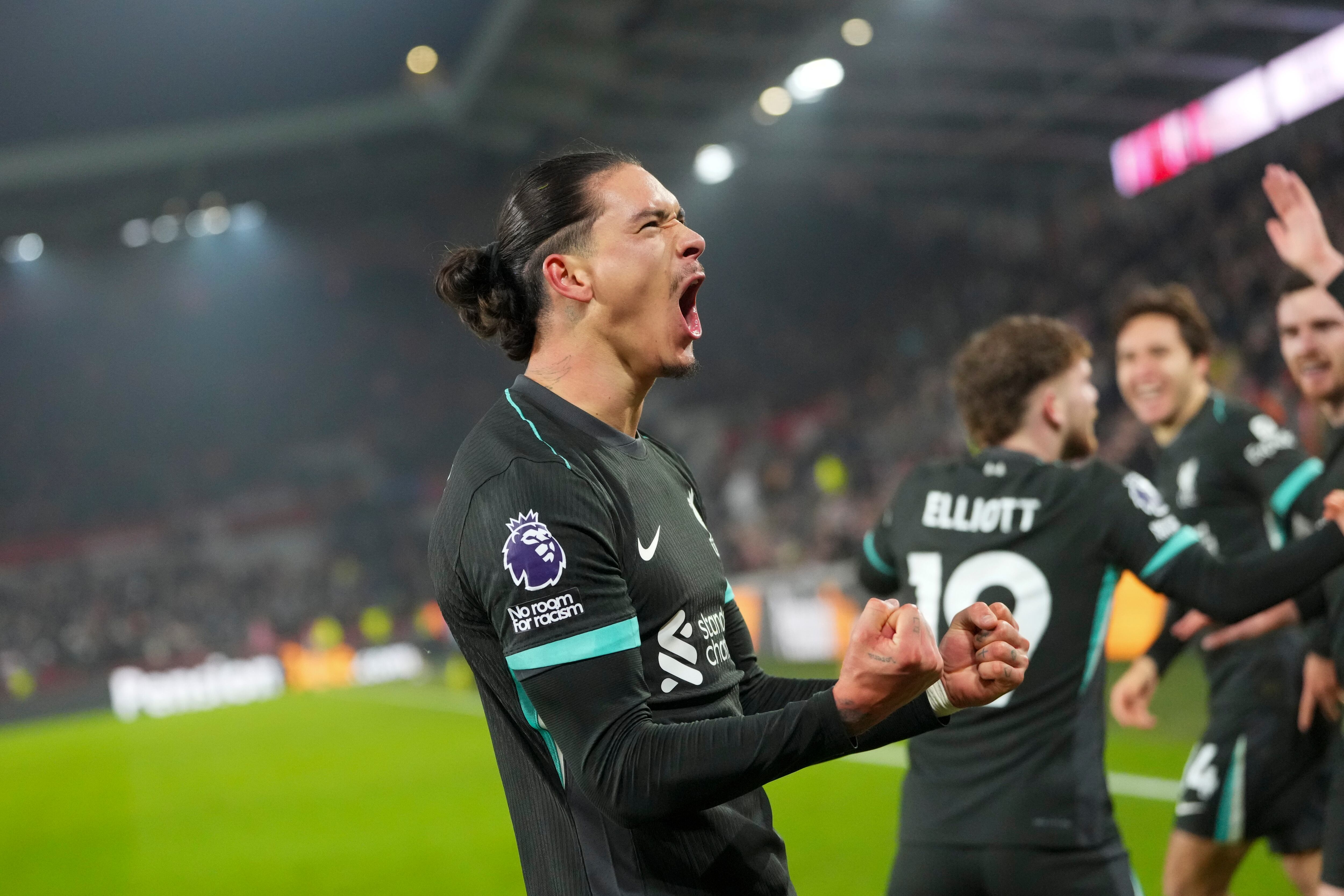 Liverpool's Darwin Nunez celebrates after scoring his side's second goal during the English Premier League soccer match between Brentford and Liverpool at the GTech Community Stadium in London, Saturday, Jan. 18, 2025. (AP Photo/Kirsty Wigglesworth)
