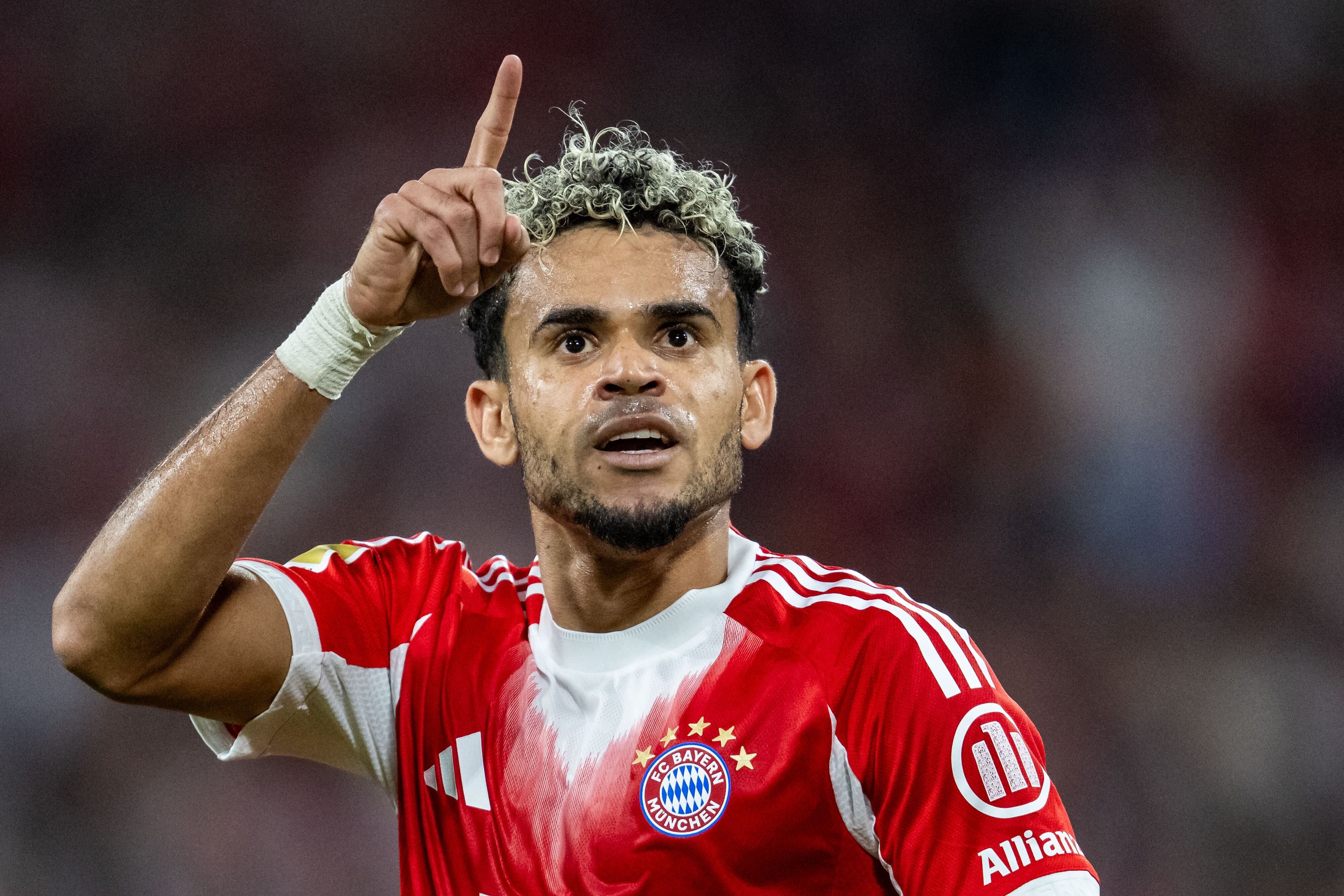 MUNICH, GERMANY - AUGUST 22: Luis Diaz of FC Bayern Muenchen celebrates after scoring his team's second goal during the Bundesliga match between FC Bayern München and RB Leipzig at Allianz Arena on August 22, 2025 in Munich, Germany. (Photo by Kevin Voigt/GettyImages)