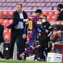 BARCELONA, SPAIN - MAY 16: Head coach Ronald Koeman of FC Barcelona comforts Lionel Messi of FC Barcelona as he walks off the pitch at the La Liga Santander match between FC Barcelona and RC Celta at Camp Nou on May 16, 2021 in Barcelona, Spain. Sporting stadiums around Spain remain under strict restrictions due to the Coronavirus Pandemic as Government social distancing laws prohibit fans inside venues resulting in games being played behind closed doors. (Photo by David Ramos/Getty Images)