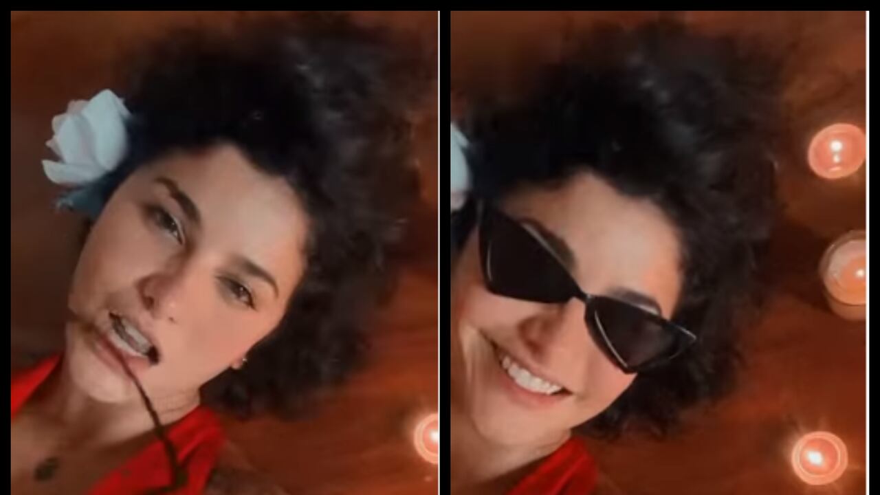 En el video aparece la artista recostada en el suelo, luciendo un vestido rojo y junto a varias velas encendidas.