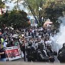 Exequias Darío Gómez, en el cementerio Campos de Paz, disturbios con gases lacrímogenos, el Esmad interviene