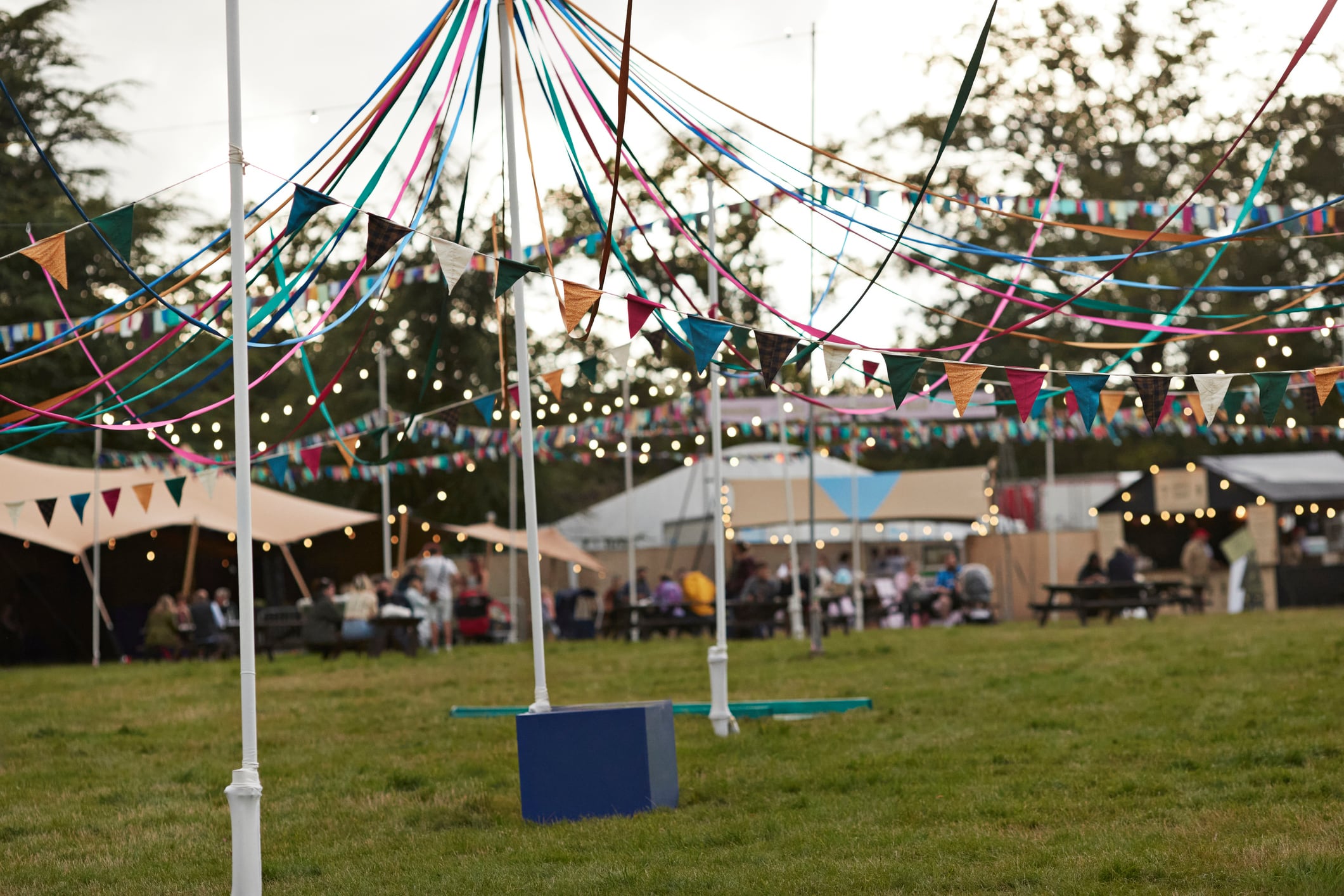 Friends hanging out at big music festival