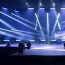Online concert. Event entertainment concept. Background for online concert. Blue stage spotlights. Empty stage with blue spotlights. Blue stage lights. Online COVID-19 concert. Live streaming concert