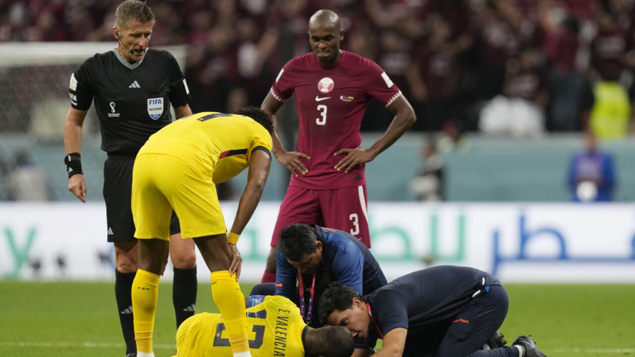 Ecuador's Enner Valencia is being treated after and injury during the World Cup group A soccer match between Qatar and Ecuador at the Al Bayt Stadium in Al Khor ,Qatar, Sunday, Nov. 20, 2022. (AP/Darko Bandic)