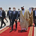 A handout picture released by the Israeli Government Press Office (GPO) shows Emirati Minister of State Ahmed al-Sayegh (R) receiving Israeli alternate prime minister and Foreign Minister Yair Lapid upon arrival at the Abu Dhabi airport in the United Arab Emirates, on June 29, 2021. (Photo by Shlomi AMSALEM / various sources / AFP) / - Israel OUT / RESTRICTED TO EDITORIAL USE - MANDATORY CREDIT "AFP PHOTO / GPO" - NO MARKETING NO ADVERTISING CAMPAIGNS - DISTRIBUTED AS A SERVICE TO CLIENTS
