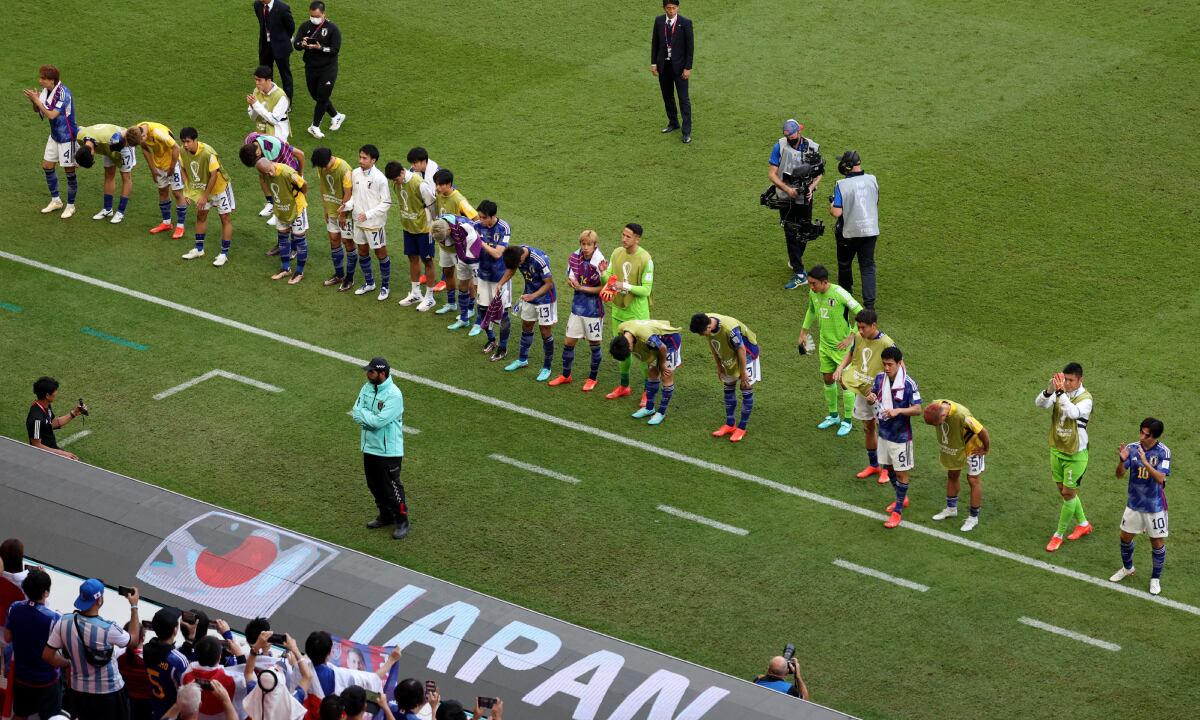 Soccer Football - FIFA World Cup Qatar 2022 - Group E - Japan v Costa Rica - Ahmad Bin Ali Stadium, Al Rayyan, Qatar - November 27, 2022 Japan players applaud fans after the match REUTERS/Marko Djurica