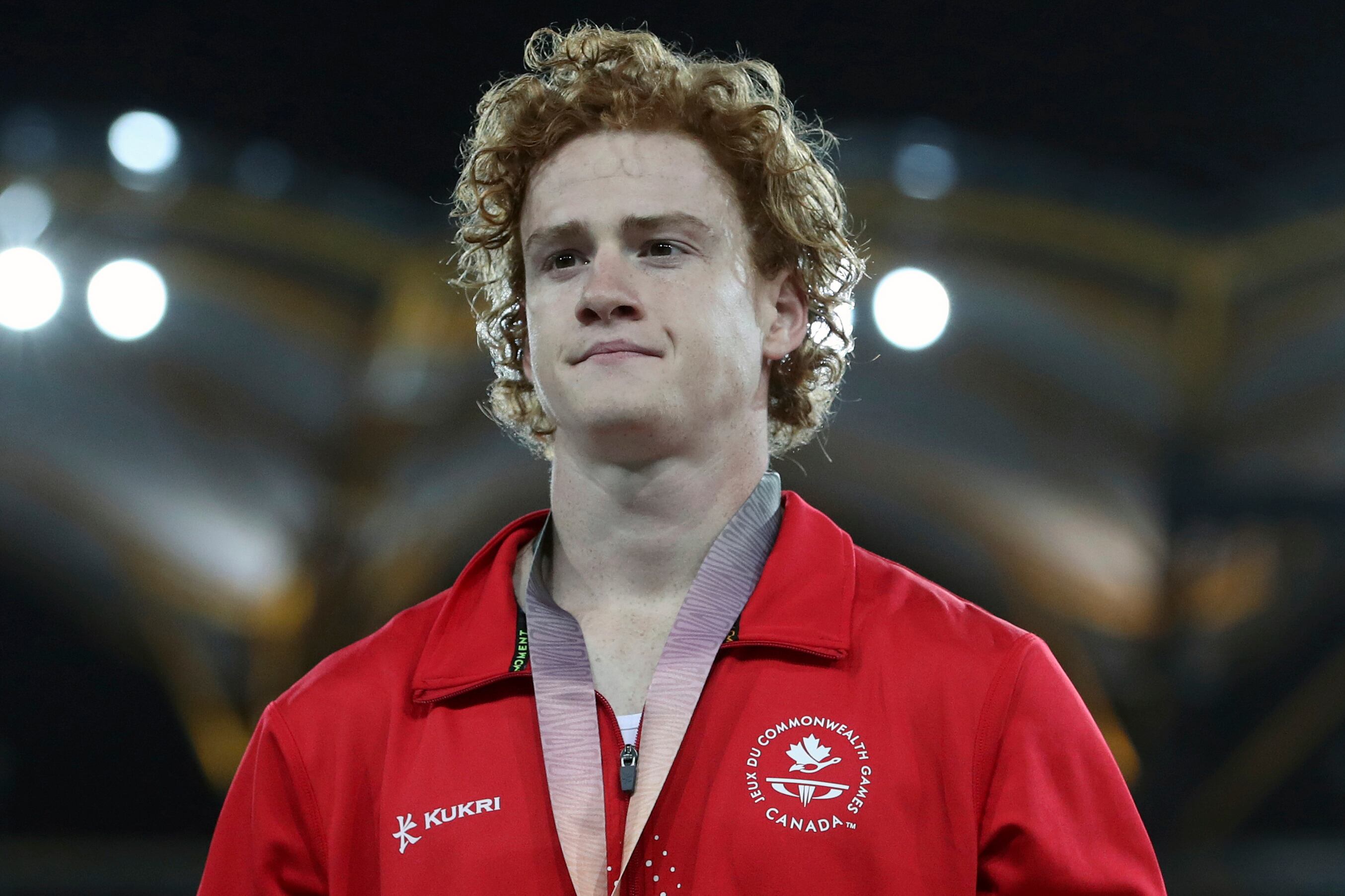 FILE - Men's pole vault silver medalist Canada's Shawnacy Barber is shown on the podium at Carrara Stadium during the 2018 Commonwealth Games on the Gold Coast, Australia, Thursday, April 12, 2018. Barber has died from medical complications. He was 29. Barber died Wednesday, Jan. 17, 2024, at home in Kingwood, Texas, his agent, Paul Doyle, confirmed to The Associated Press. (AP Photo/Mark Schiefelbein, File)