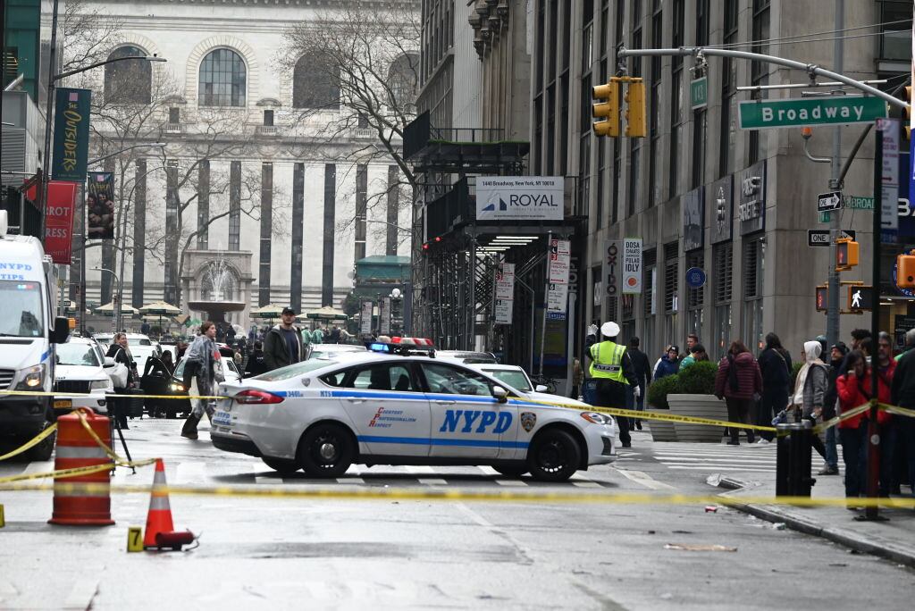 MANHATTAN, NEW YORK, UNITED STATES - MARCH 16: A view from the scene, where a man was set on fire in the heart of Times Square in Midtown Manhattan, New York, United States March 16, 2025. The NYPD is searching for a suspect who set a man on fire in Midtown. Police received a 911 call about a person on fire at 41st Street and 7th Avenue. When police arrived at the scene, a 49-year-old man told them that a male suspect had approached him, thrown a liquid on him and started a fire. The victim suffered burns to his face and arms. (Photo by Kyle Mazza/Anadolu via Getty Images)
