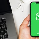 Male hand holding a smartphone with WhatsApp app on the screen. Office environment. Rio de Janeiro, RJ, Brazil. January 2022.