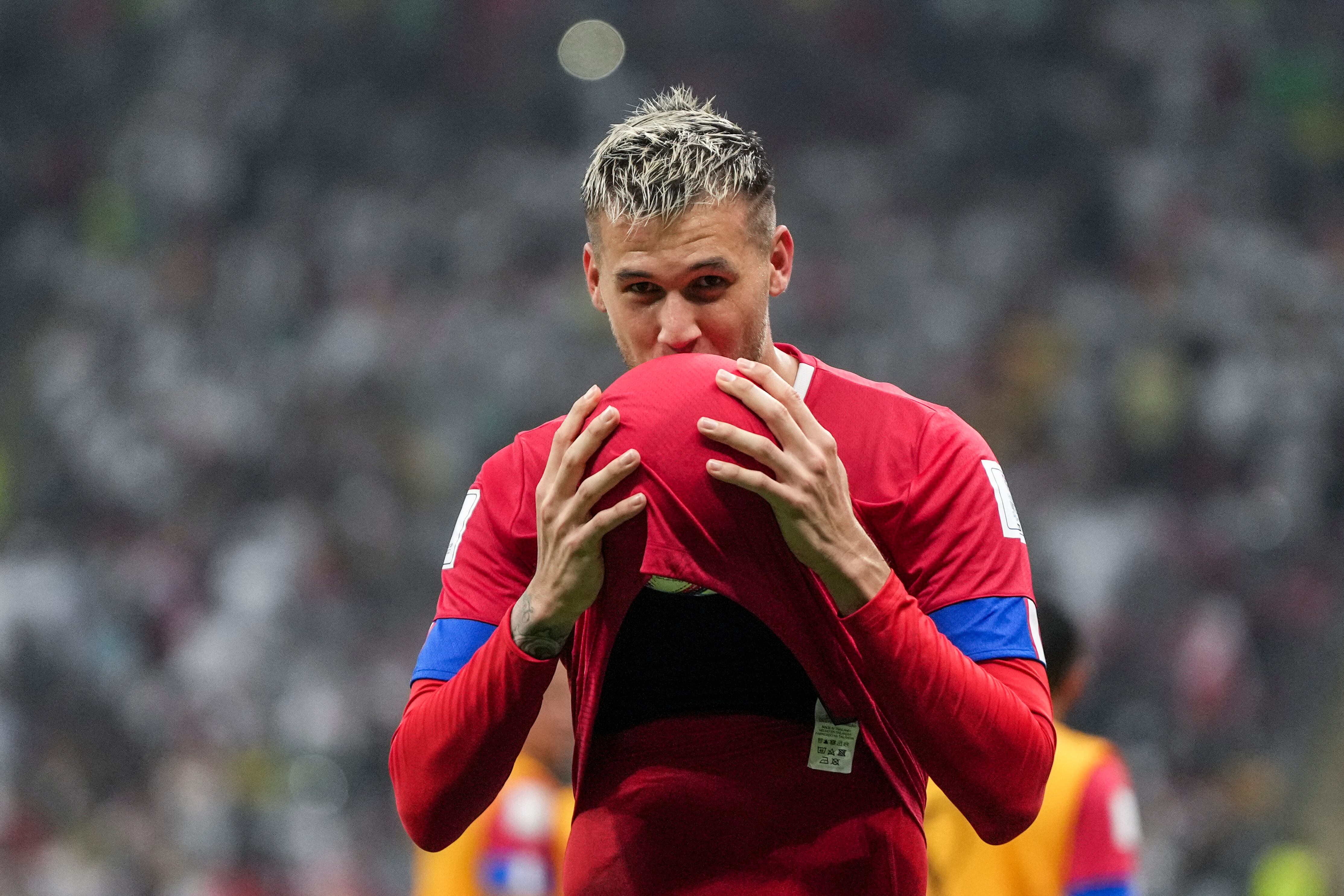 Costa Rica's Juan Pablo Vargas celebrates after scoring his side's second goal during the World Cup group E soccer match between Costa Rica and Germany at the Al Bayt Stadium in Al Khor, Qatar, Thursday, Dec. 1, 2022. (AP Photo/Matthias Schrader)