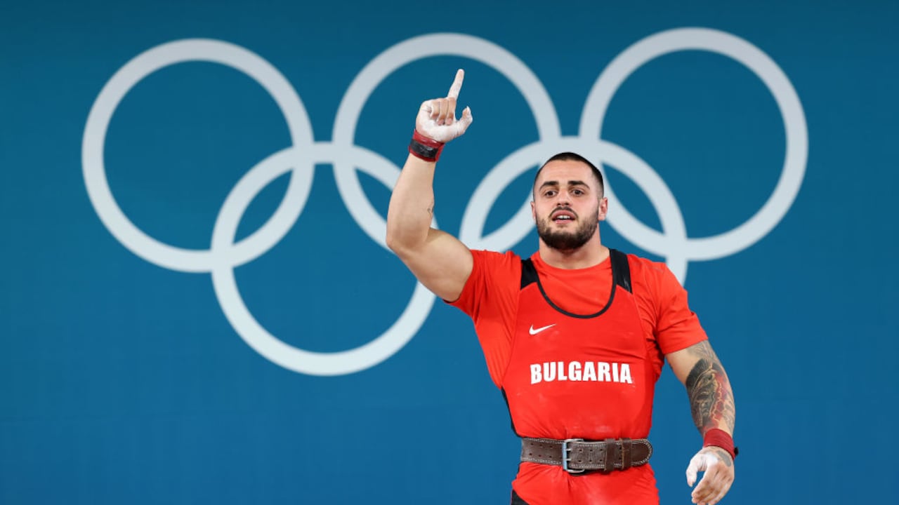 PARIS, FRANCE - AUGUST 09: Karlos May Nasar of Team Bulgaria celebrates during the Weightlifting Men's 89kg on day fourteen of the Olympic Games Paris 2024 at South Paris Arena on August 09, 2024 in Paris, France. (Photo by Lars Baron/Getty Images)