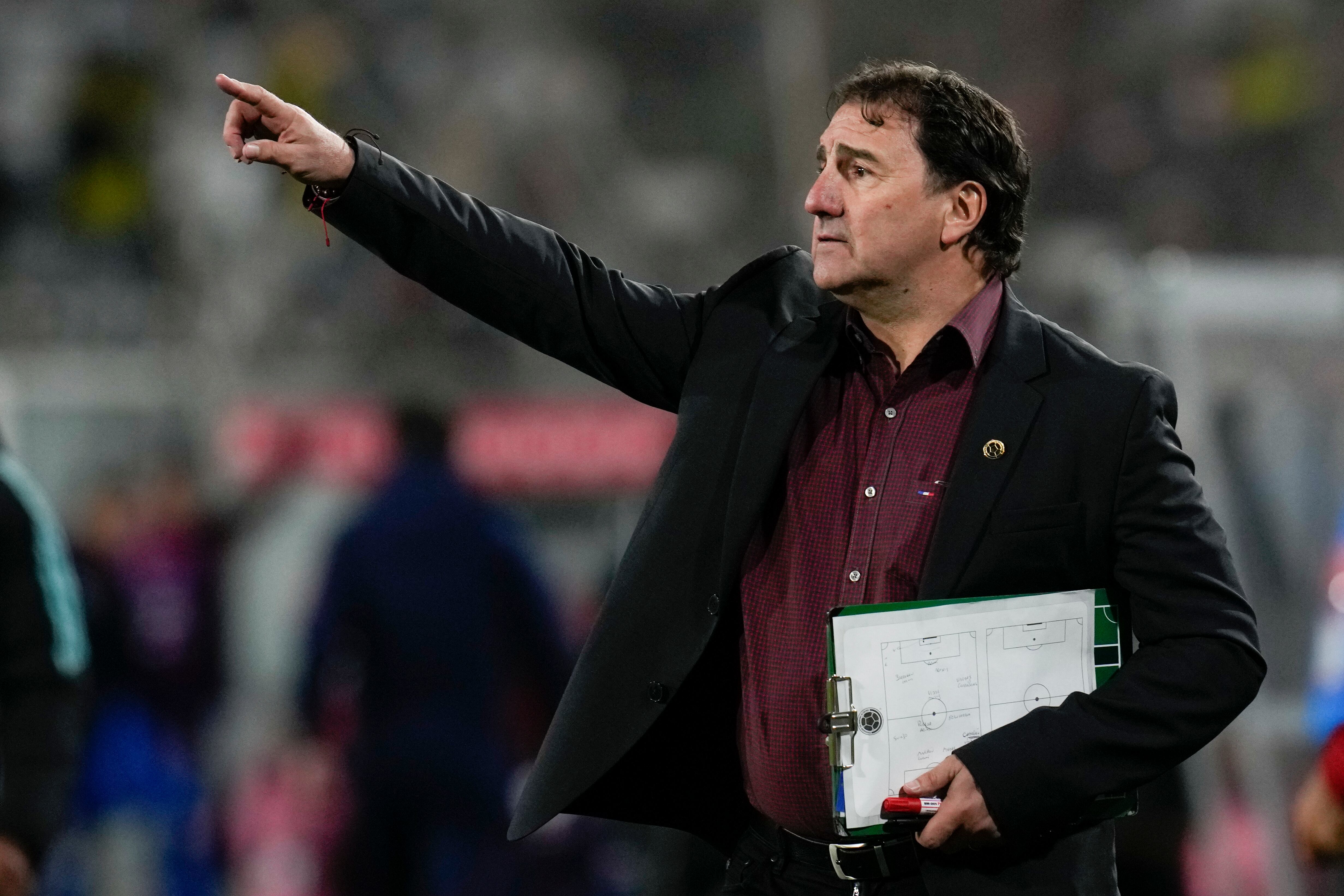 Colombia's coach Nestor Lorenzo reacts during a qualifying soccer match against Chile for the FIFA World Cup 2026 at Monumental stadium in Santiago, Chile, Tuesday, Sept. 12, 2023. (AP Photo/Esteban Felix)