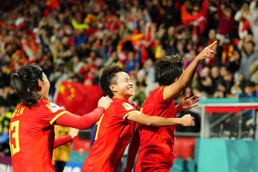 Jugadoras de la Selección China festejando.