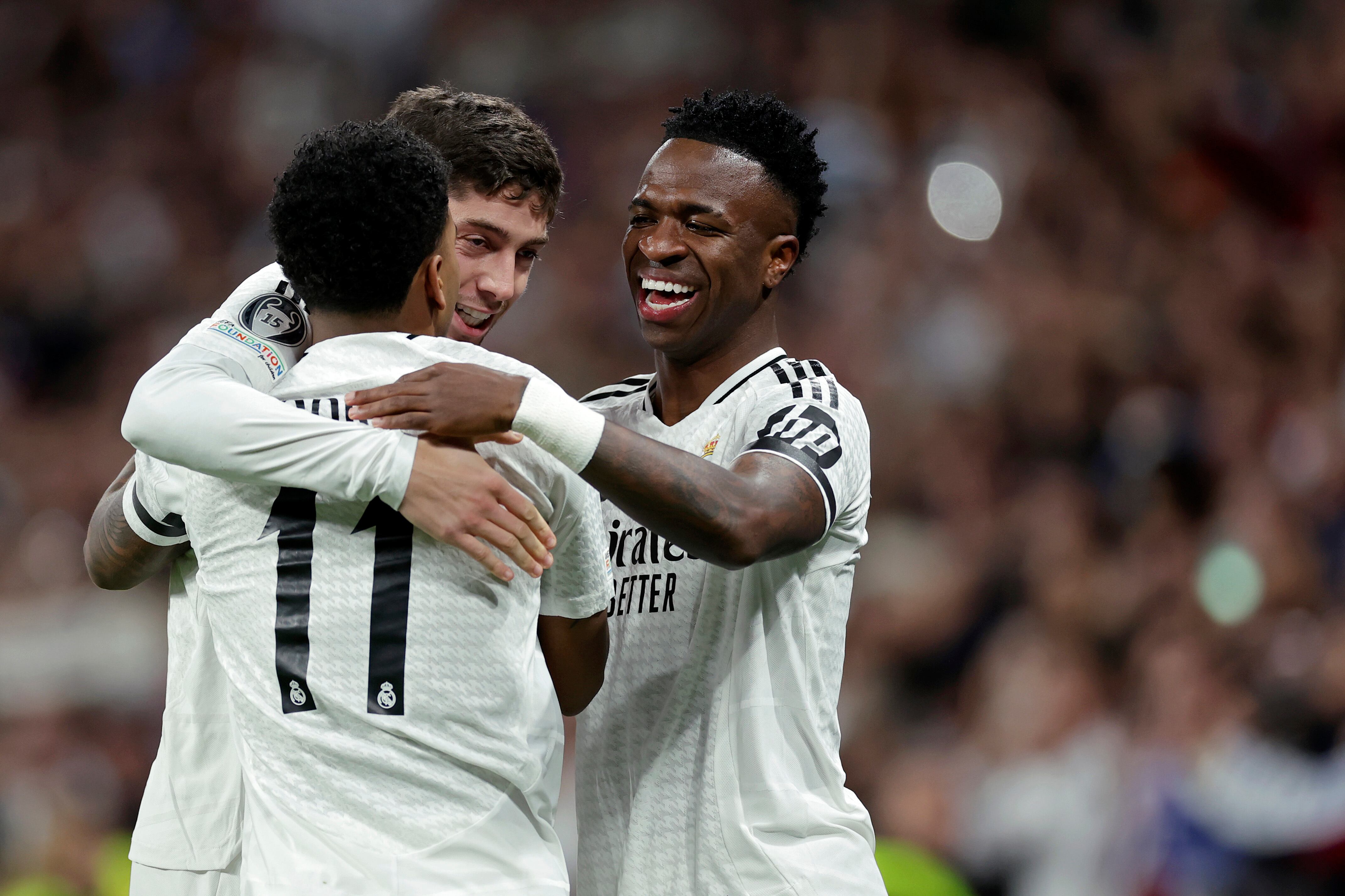 MADRID, SPAIN - MARCH 4: Rodrygo of Real Madrid celebrates 1-0 with Vinicius Junior of Real Madrid, Federico Valverde of Real Madrid  during the UEFA Champions League  match between Real Madrid v Atletico Madrid at the Estadio Santiago Bernabeu on March 4, 2025 in Madrid Spain (Photo by Maria Gracia Jimenez/Soccrates/Getty Images)