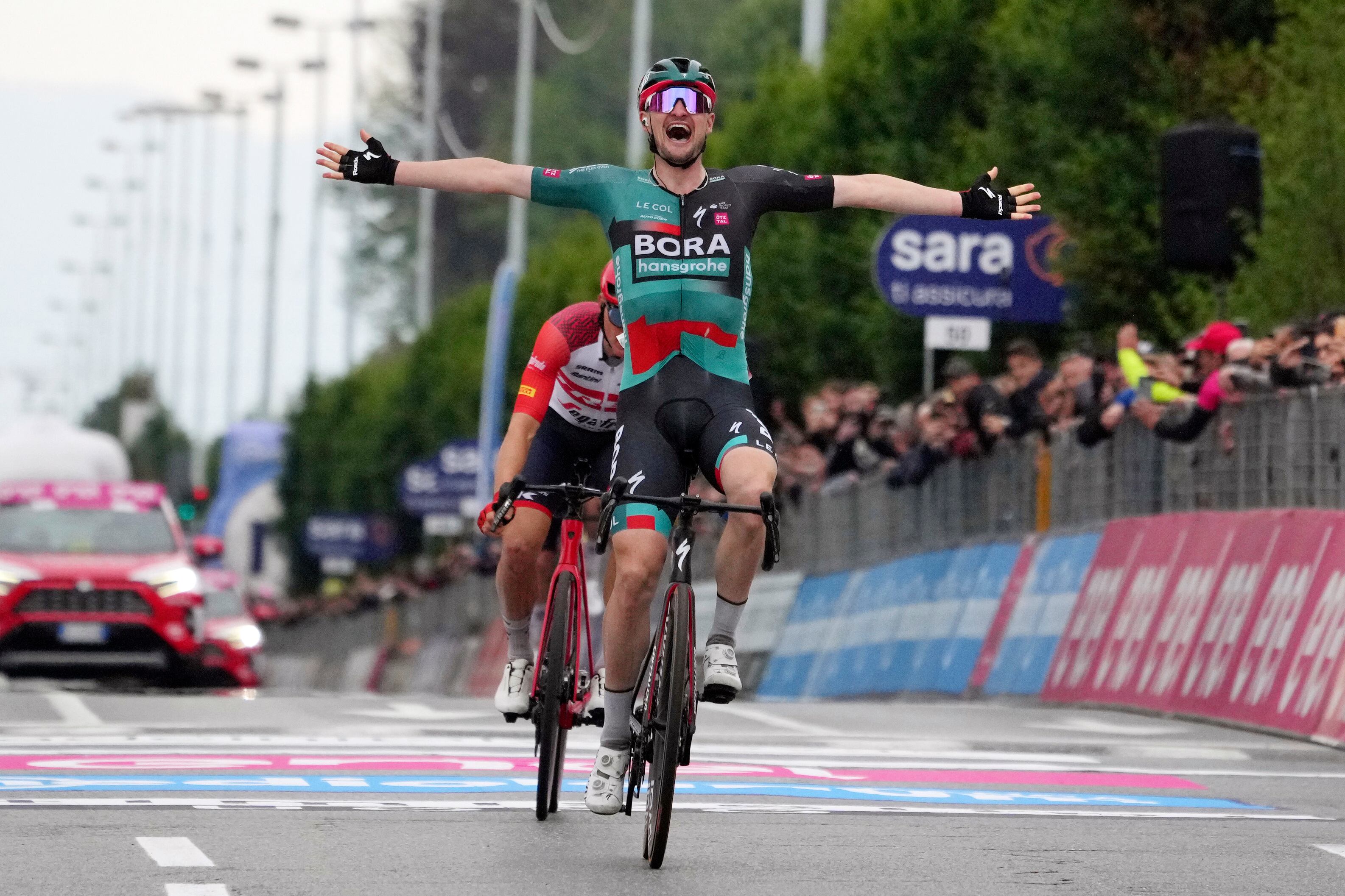 Germany's Nico Denz celebrates winning the 12th stage of the Giro D'Italia, tour of Italy cycling race, from Bra to Rivoli, Thursday, May 18, 2023. (Gian Mattia D'Alberto/LaPresse via AP)