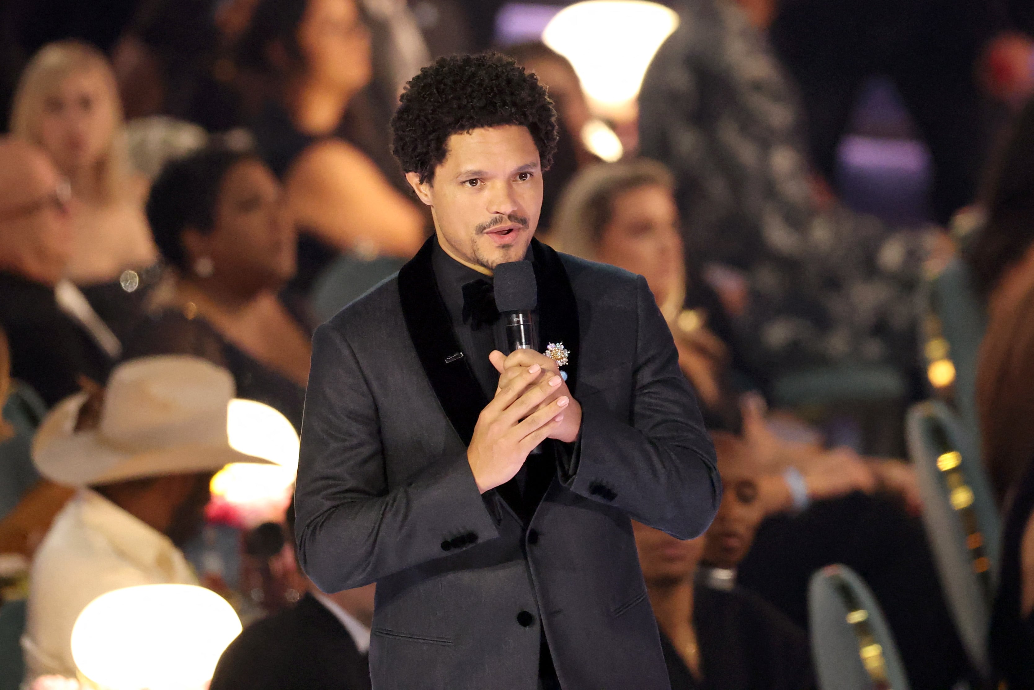 LOS ANGELES, CALIFORNIA - FEBRUARY 02: (FOR EDITORIAL USE ONLY) Trevor Noah speaks onstage during the 67th GRAMMY Awards at Crypto.com Arena on February 02, 2025 in Los Angeles, California.   Amy Sussman/Getty Images/AFP (Photo by Amy Sussman / GETTY IMAGES NORTH AMERICA / Getty Images via AFP)